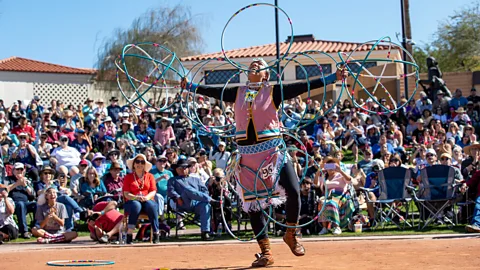 Heard Museum Dancers spin up to 50 hoops and interlock them around the body to represent animals and symbols (Credit: Heard Museum)