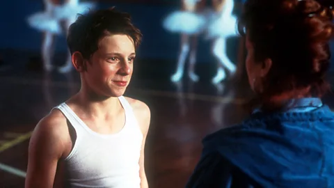 Alamy A the end of Billy Elliot, which starred Jamie Bell, Adam Cooper is shown as the adult Billy, about to perform as The Swan (Credit: Alamy)