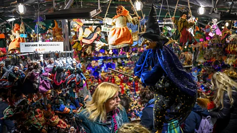 Getty Images The Befana is celebrated each January at the Festa della Befana in Urbania (Credit: Getty Images)