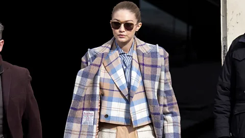 Getty Images Gigi Hadid wearing a tweed coat (Credit: Getty Images)