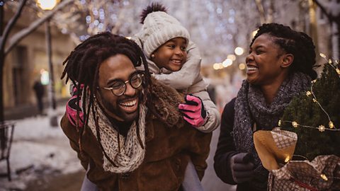 Family out together for a winter walk.