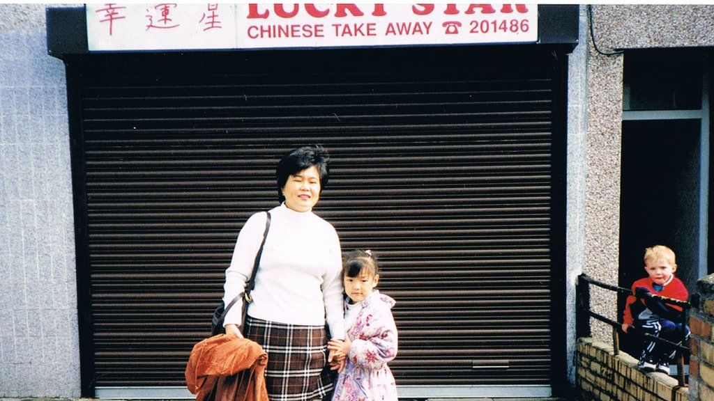 Angela and her Mum outside the takeaway in 1995.