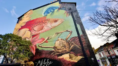 Marine mural on side of building