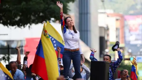 María Corina Machado greets her supporters at a rally in Caracas, Venezuela. Photo: 9 January 2025