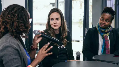 Andela Christina Sass (left) with Andela employees