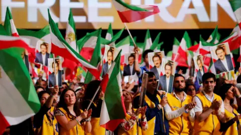 Reuters Supporters of the National Council of Resistance of Iran attend a rally in Villepinte, near Paris, France, June 30, 2018