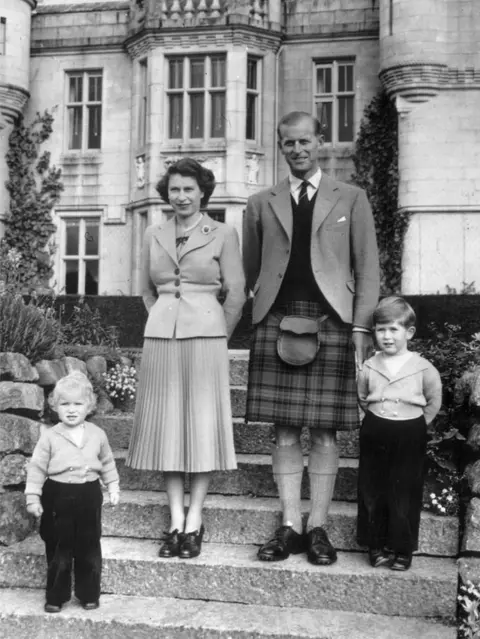 Getty Images 19th September 1952: Queen Elizabeth II and The Prince Philip, Duke of Edinburgh with their two young children, Princess Anne and Prince Charles outside Balmoral Castle