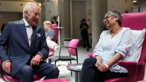 King Charles with a woman in University College Hospital Macmillan Cancer Centre