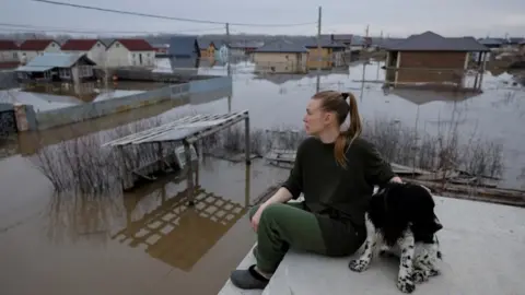 Local resident with dog in Ivanovskoye, Orenburg region