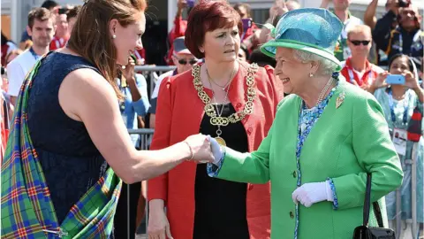 Getty Images Queen Elizabeth meets delegates and athletes on a visit to the Athletes' Village during day one of the 2014 Commonwealth Games in Glasgow