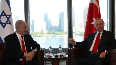 Getty Images Turkish President Recep Tayyip Erdogan and Israeli Prime Minister Benjamin Netanyahu pictured in September 2023