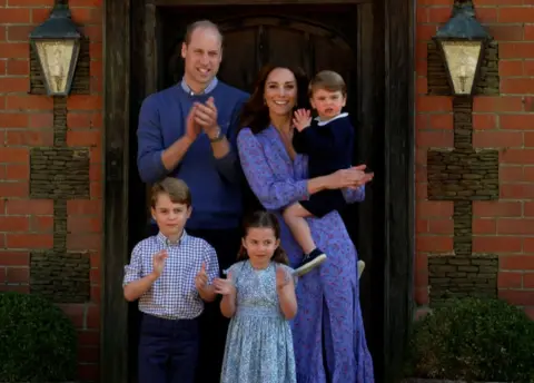 Comic Relief/BBC Children in Need The Duke and Duchess of Cambridge with Prince George, Princess Charlotte and Prince Louis clapping for carers as part of the BBC Children in Need and Comic Relief "Big Night In" in April 2020