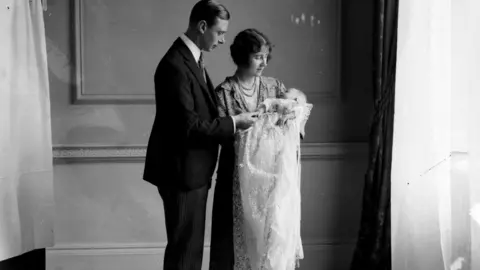 PA The Duke and Duchess of York with their eldest baby daughter Princess Elizabeth at her christening