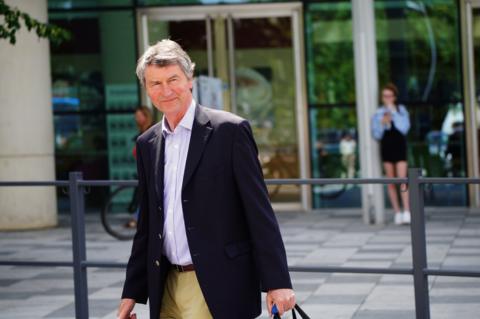 Vice Admiral Sir Tim Laurence leaves Southmead Hospital in Bristol after visiting his wife Princess Anne