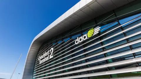 Image of the outside of Terminal 2 at Dublin Airport, with daa logo