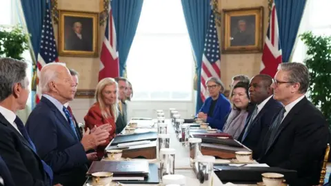 Prime Minister Sir Keir Starmer (right) and Foreign Secretary David Lammy (second right) during a meeting with US President Joe Biden (centre left) in the Blue Room at the White House in Washington DC. Picture date: Friday September 13, 2024.