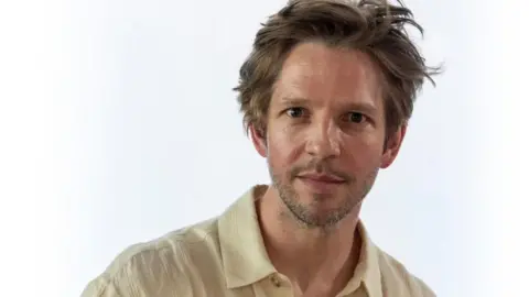 A photo of Damien Molony