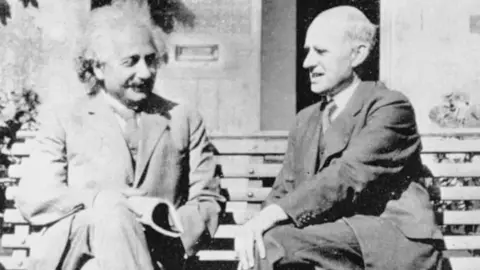 Science Photo Library Albert Einstein (left) and Arthur Stanley Eddington (right) at the University of Cambridge Observatory, UK. Photo: 1930