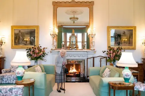 Jane Barlow/PA Wire Queen Elizabeth in her last photo in the drawing room at Balmoral Castle in 2022