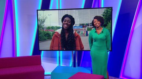 Emma-Louise on the Newsround set with Shanequa in the screen