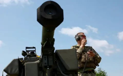 Reuters A Ukrainian serviceman of an air defence unit prepares a portable air-defence system for work during his combat shift, amid Russia's attack on Ukraine, in the Kyiv region, 27 June 2023