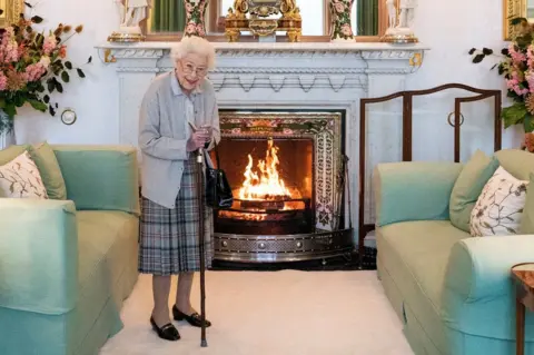 PA Media Queen Elizabeth waits in the drawing room at Balmoral before receiving new prime minister Liz Truss for an audience on 6 September 2022