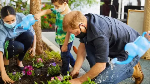 Reuters Prince Harry and Meghan plants flower in LA