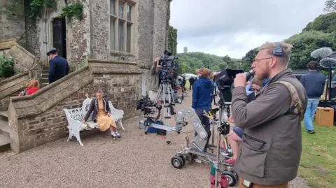Filming one of the pupils outside Hartland Abbey
