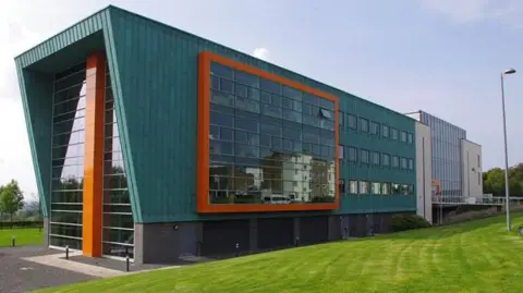 Geograph/Ian Taylor a modern green and orange building housing computer sciences department