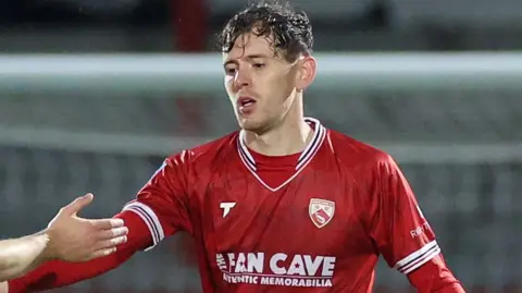 Morecambe's Ben Tollitt celebrates scoring against Nottingham Forest Under-21s in the EFL Trophy