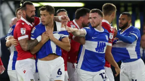 Birmingham City and Wrexham players during their game earlier this month