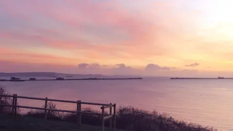 Lesley FRIDAY - Pink sky over Portland Harbour