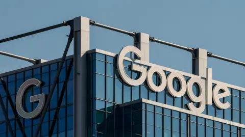 Close-up shot of a Google office building in Atlanta, Georgia, displaying the Google logo