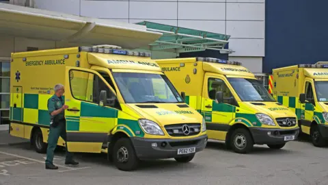 Ambulances lined up outside hospital 