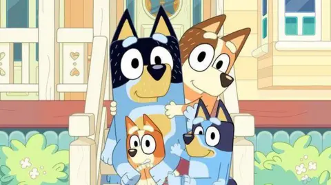 Bluey and family outside their house, a shot from the children's animation