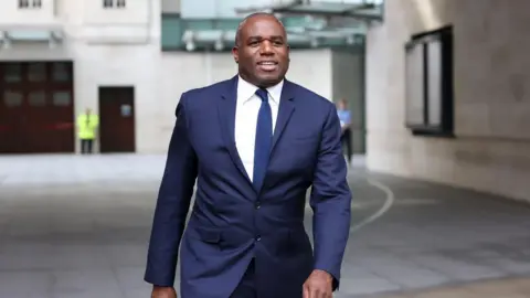 Foreign Secretary David Lammy walks outside the BBC's Broadcasting House