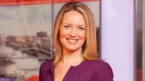 Beccy Barr reading the news for BBC North West Tonight