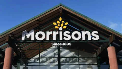 Sign on the front of a Morrisons supermarket