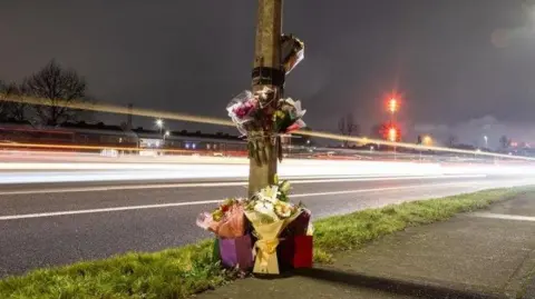 Flowers laid at the scene near Blanchardstown Shopping Centre on 26 December