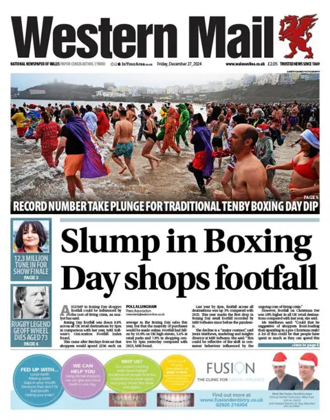 Western Mail Western Mail front page: Slump in Boxing day shops footfall. story 2: record number take plunge for traditional Tenby Boxing Day dip .