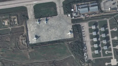 Maxar Technologies A satellite image from Maxar Technologies showing planes at Hmeimim air base on 15 December