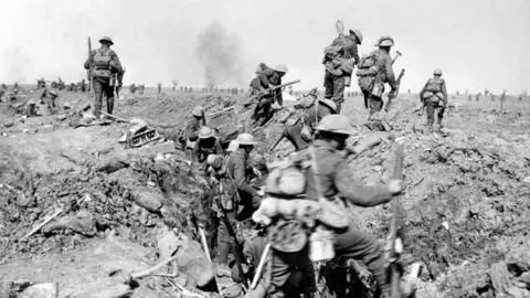 PA A black and white image of soldiers in a trench in the Battle of the Somme.