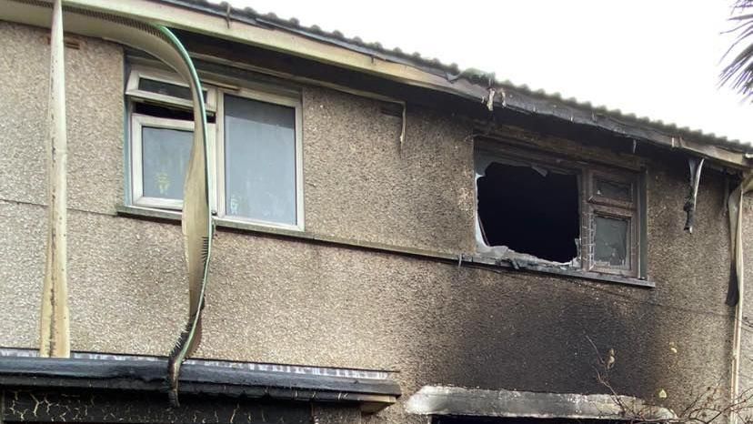 The upstairs of a house which has been burnt out by fire 