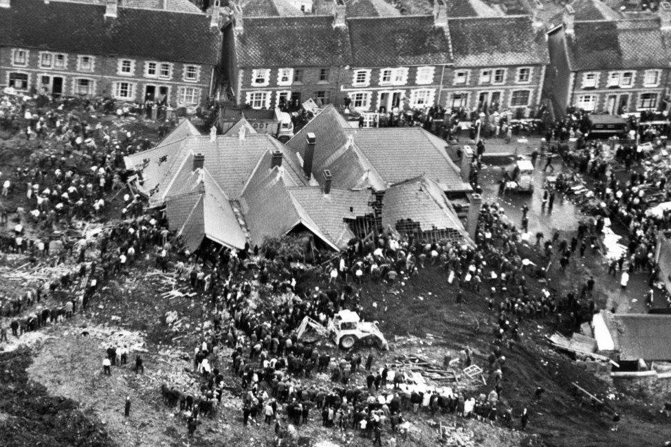 Rescuers digging for trapped children after the slag heap engulfed Pantglas Junior School