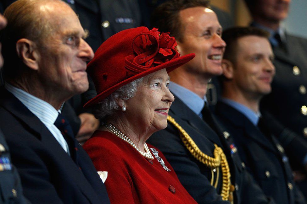 The Queen and the Duke of Edinburgh during a tour of RAF Valley in 2011 where grandson Prince William was stationed as a search and rescue helicopter pilot