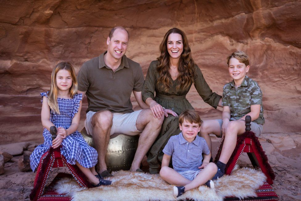 Photograph from Christmas card issued by the Duke and Duchess of Cambridge showing them with their three children Prince George (right), Princess Charlotte and Prince Louis in Jordan earlier this year