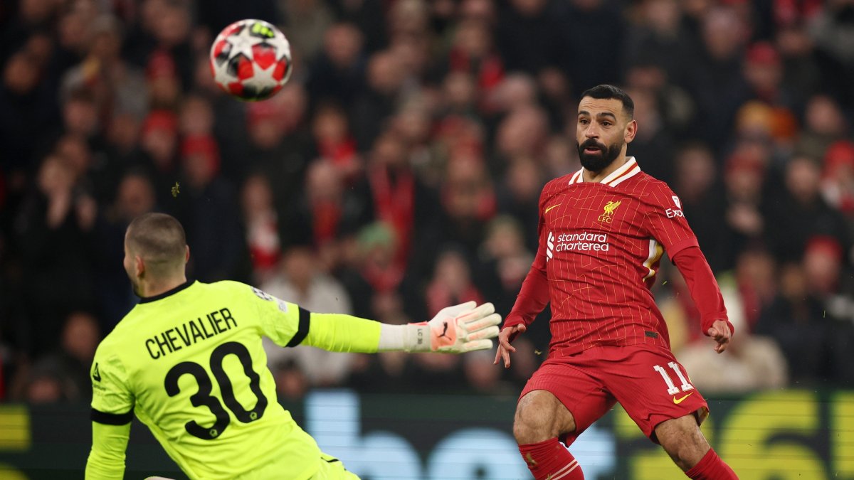 Liverpool&#039;s Mohamed Salah (R) scores in a UEFA Champions League league match against Lille, in Liverpool, U.K., Jan. 21, 2025. (EPA Photo)