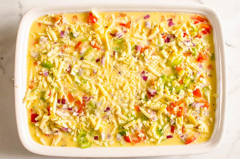 Assembled and unbaked egg casserole.