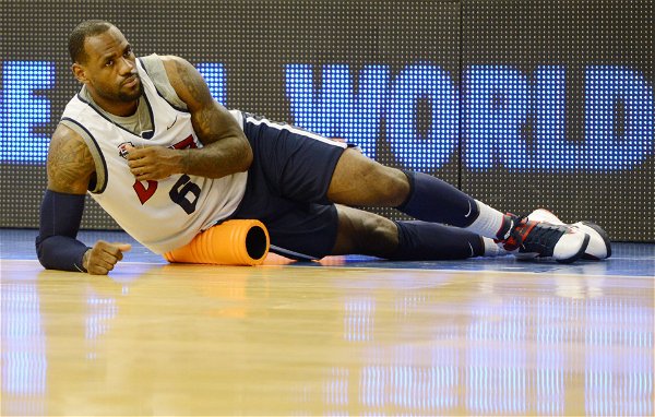BASKETBALL: USA Team Training July 21, 2012; Barcelona, SPAIN; USA forward LeBron James (6) stretches during practice in