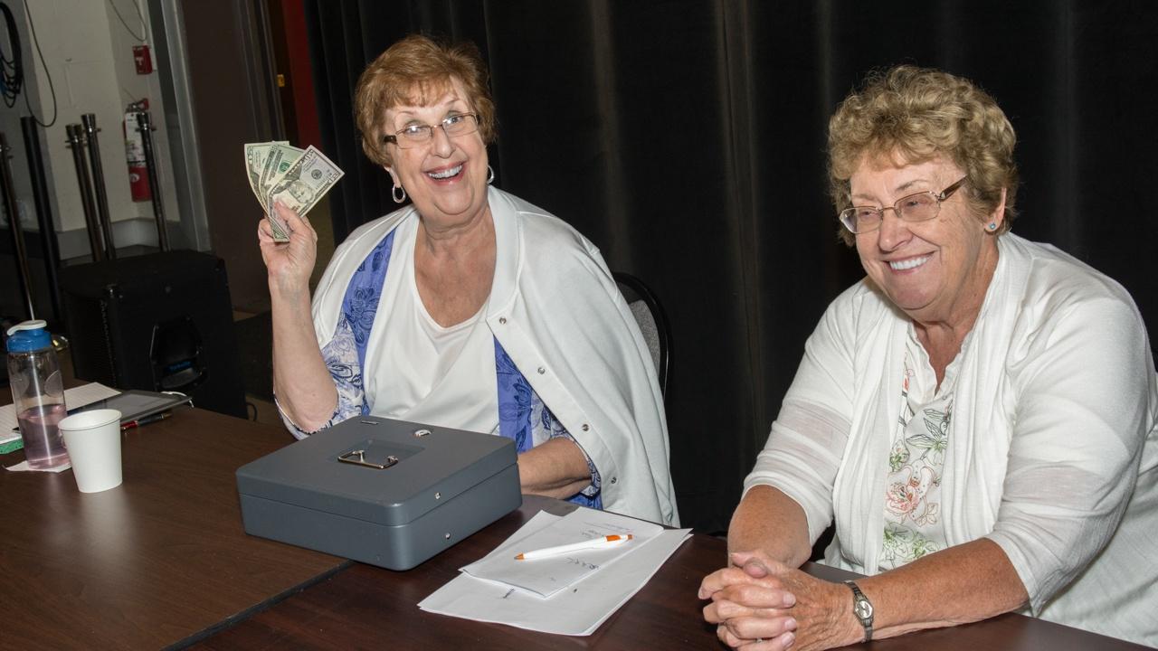 Volunteer cashiers at the Classical 94.5 WNED Album Sale